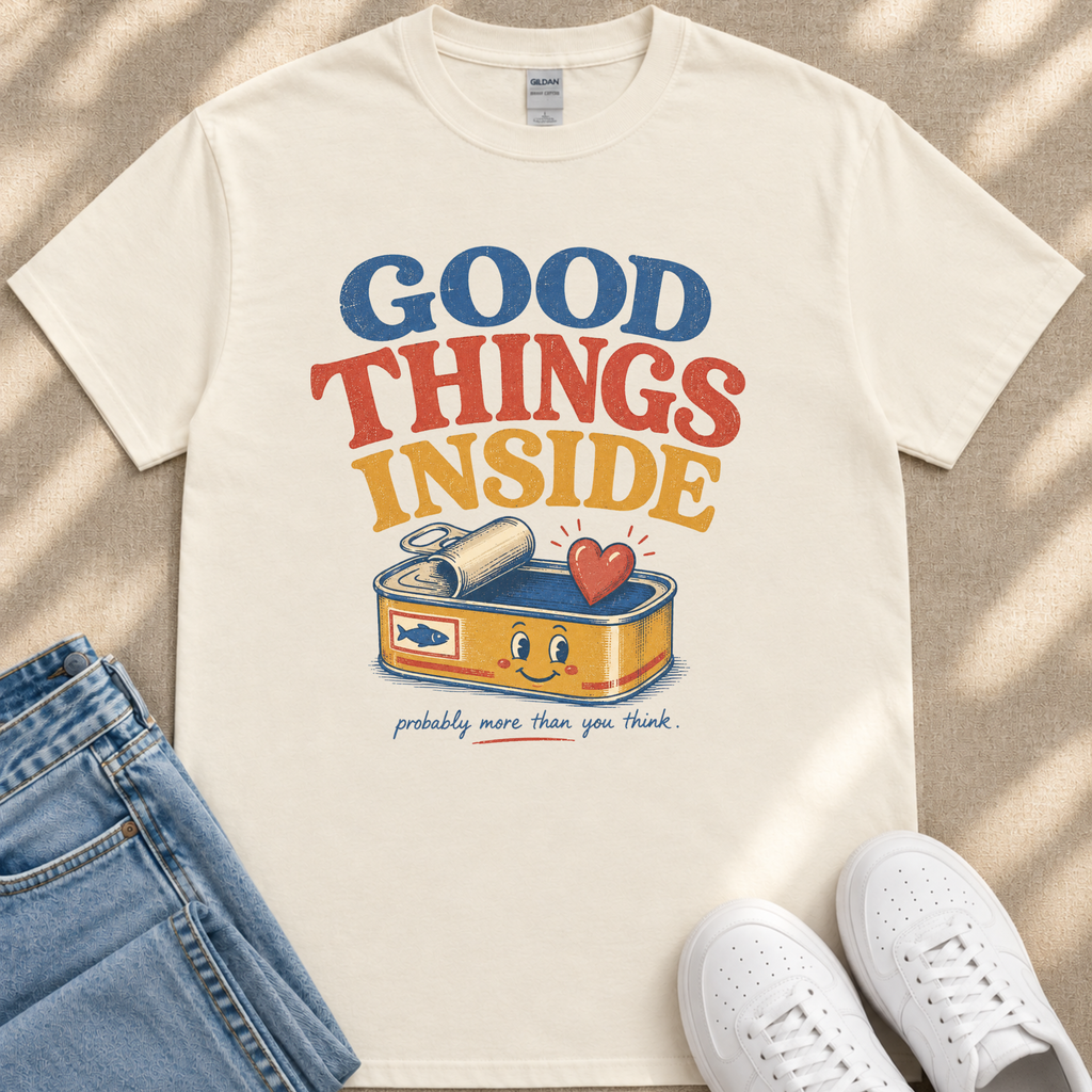 A white t-shirt with a colorful graphic design that says "GOOD THINGS INSIDE probably more than you think" printed on it.