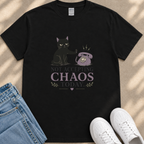 A black t-shirt with a graphic design depicting a cat and a telephone, along with the text "NOT ACCEPTING CHAOS TODAY" printed on it.