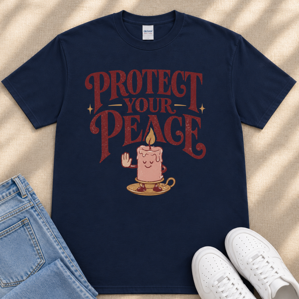 A navy blue t-shirt with a graphic design featuring a candle and the text "PROTECT YOUR PEACE" printed on it.
