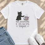 A white t-shirt with a graphic design depicting a black cat and a telephone, along with the text "NOT ACCEPTING CHAOS TODAY".