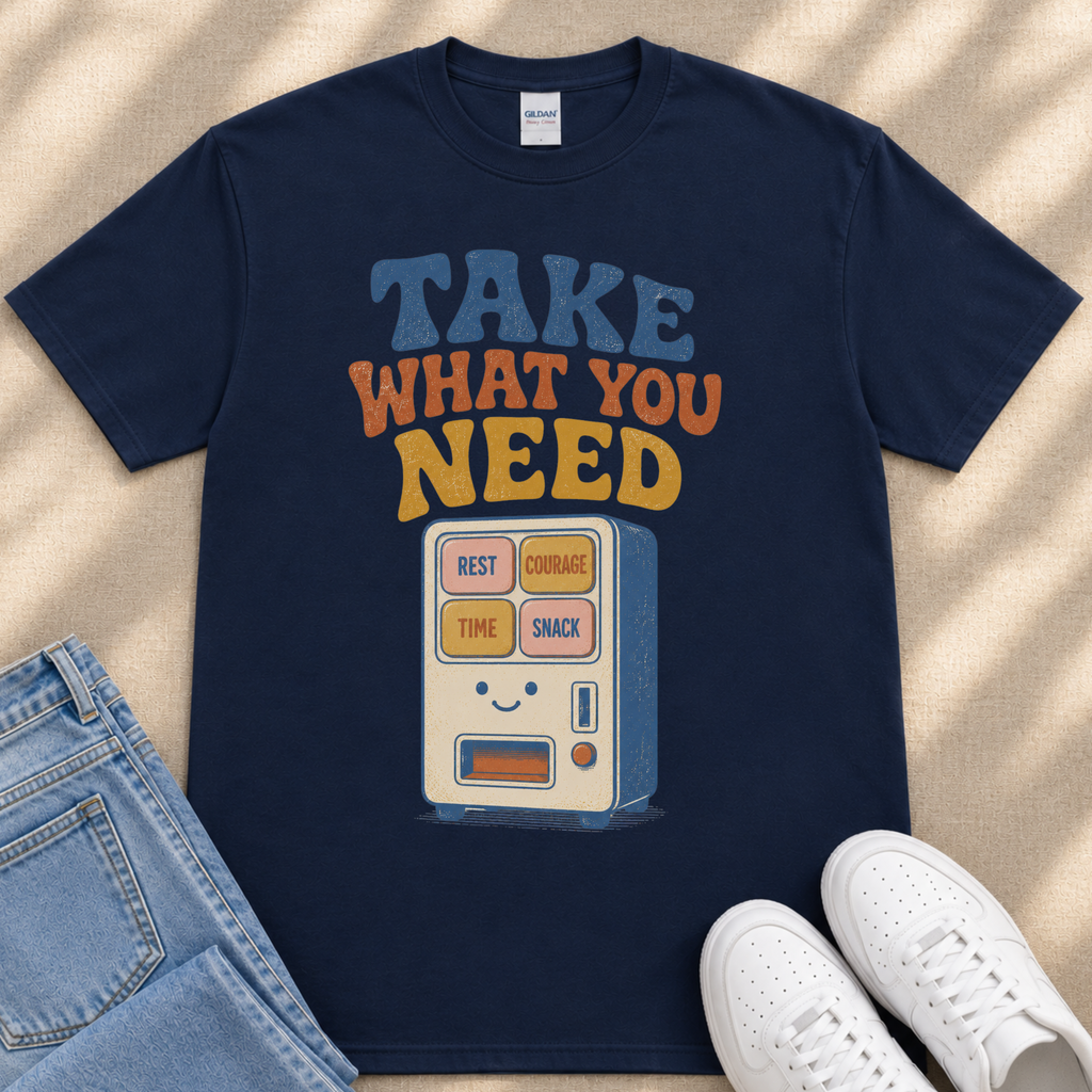 A navy blue t-shirt with a graphic design featuring a vending machine with the text "TAKE WHAT YOU NEED" printed on it.